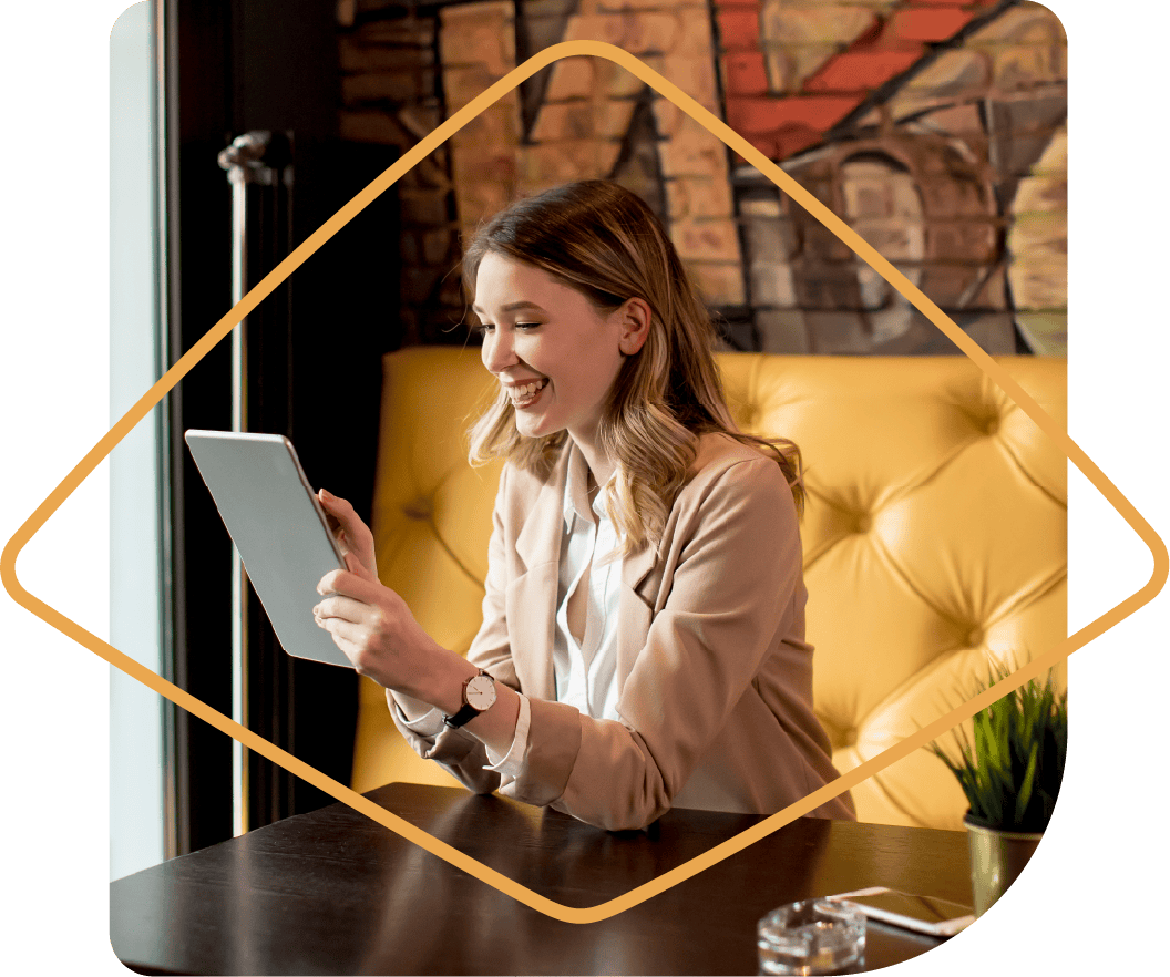 Businesswoman in modern office interacting with a tablet device